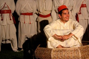 Man Wearing a Fez Cap